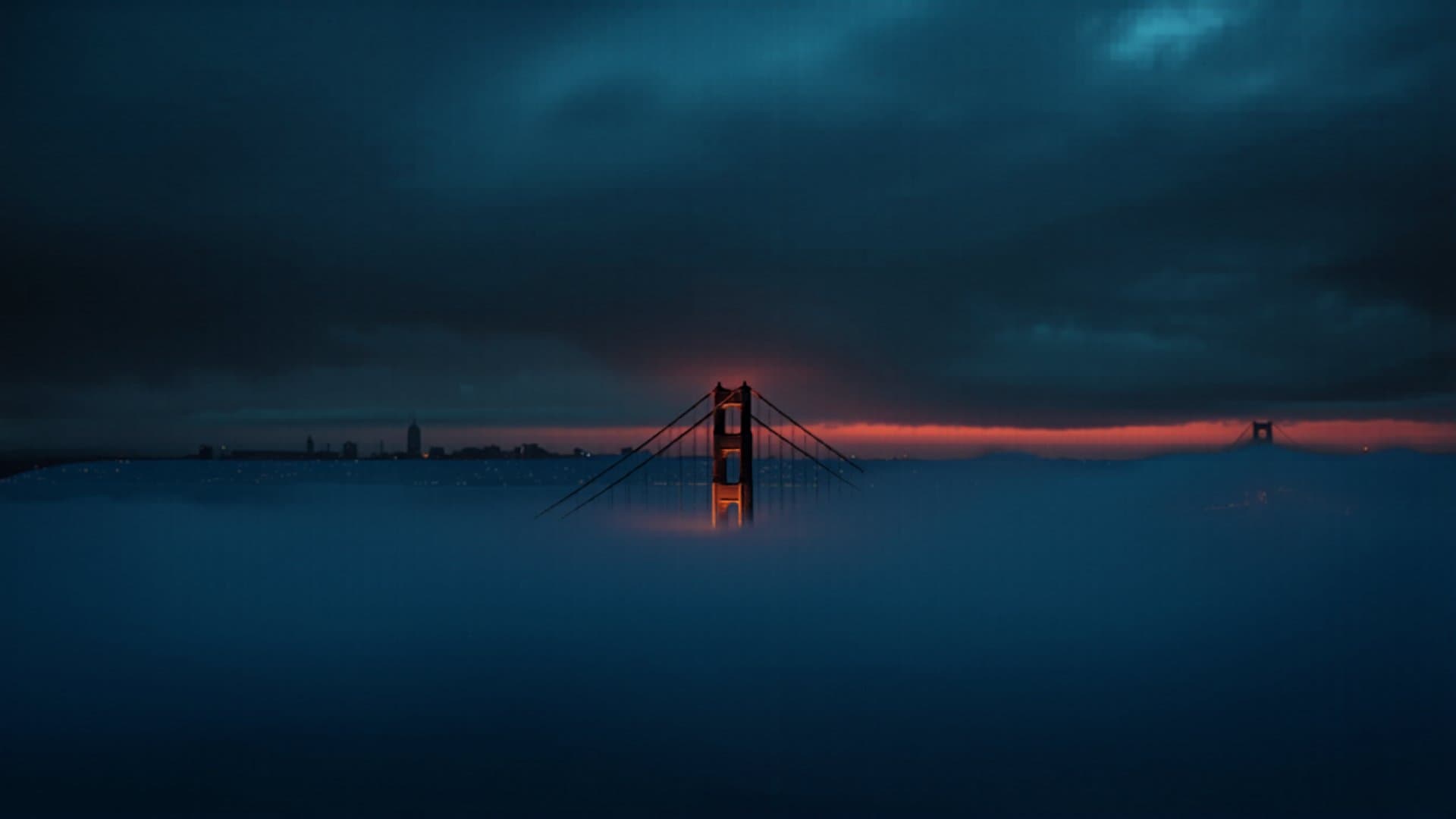 San Francisco California skyline with Golden Gate Bridge at dusk